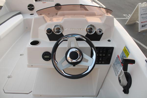 Slide: The Image of 2024 Starcraft 171 SVX boat dashboard with steering wheel and control panel. - 12