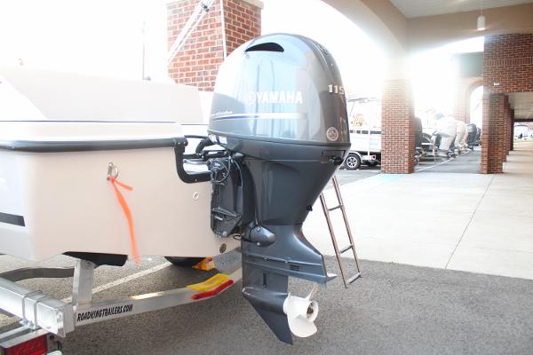 Slide: The Image of 2024 Starcraft 171 SVX boat with Yamaha 115 outboard motor on trailer. - 14