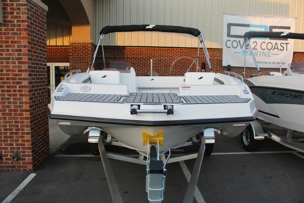Slide: The Image of 2024 Starcraft 171 SVX boat displayed at Cove 2 Coast Marine dealership. - 2