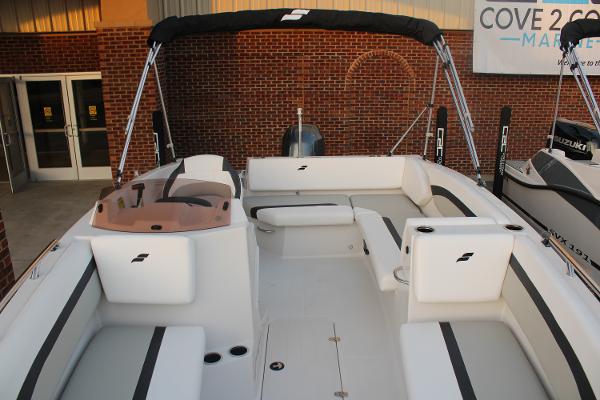 Slide: The Image of 2024 Starcraft 171 SVX boat interior with white seating and black accents. - 4