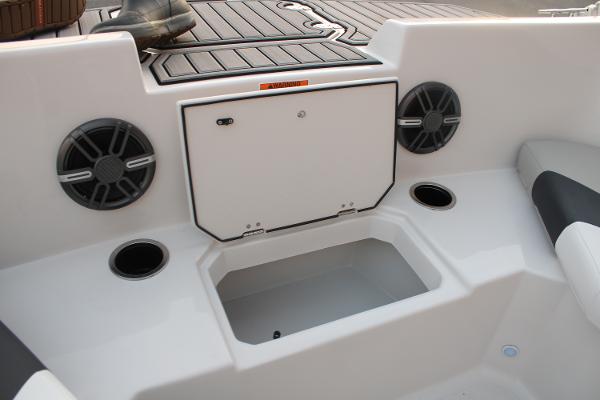 Slide: The Image of 2024 Starcraft 171 SVX boat interior with storage compartment and speakers. - 8
