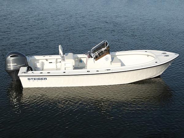 Slide: The Image of 2024 Steiger Craft 21 Classic boat on water. - 1