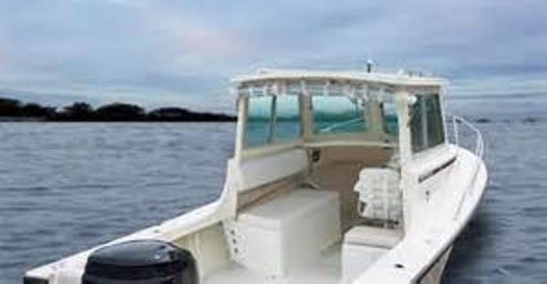Slide: The Image of 2024 Steiger Craft 23 Miami boat on open water. - 1