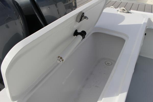 Slide: The Image of Open storage compartment on a 2024 Steiger Craft 31 Miami boat. - 37