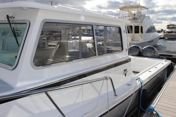 Slide: The Image of 2024 Steiger Craft 31 Miami boat docked at marina. - 8