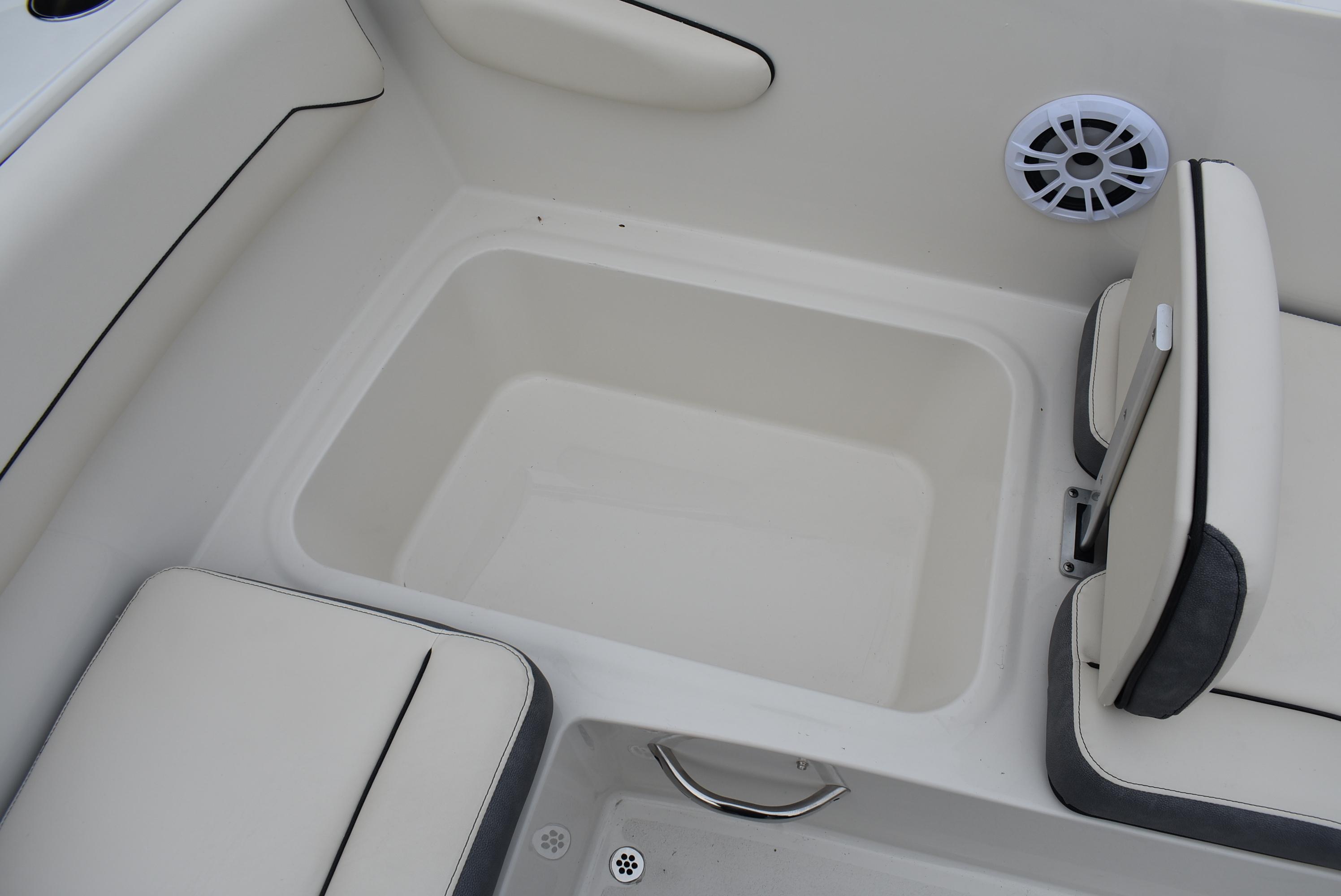 Slide: The Image of 2023 Stingray 172SC boat interior with seating and storage compartment. - 14