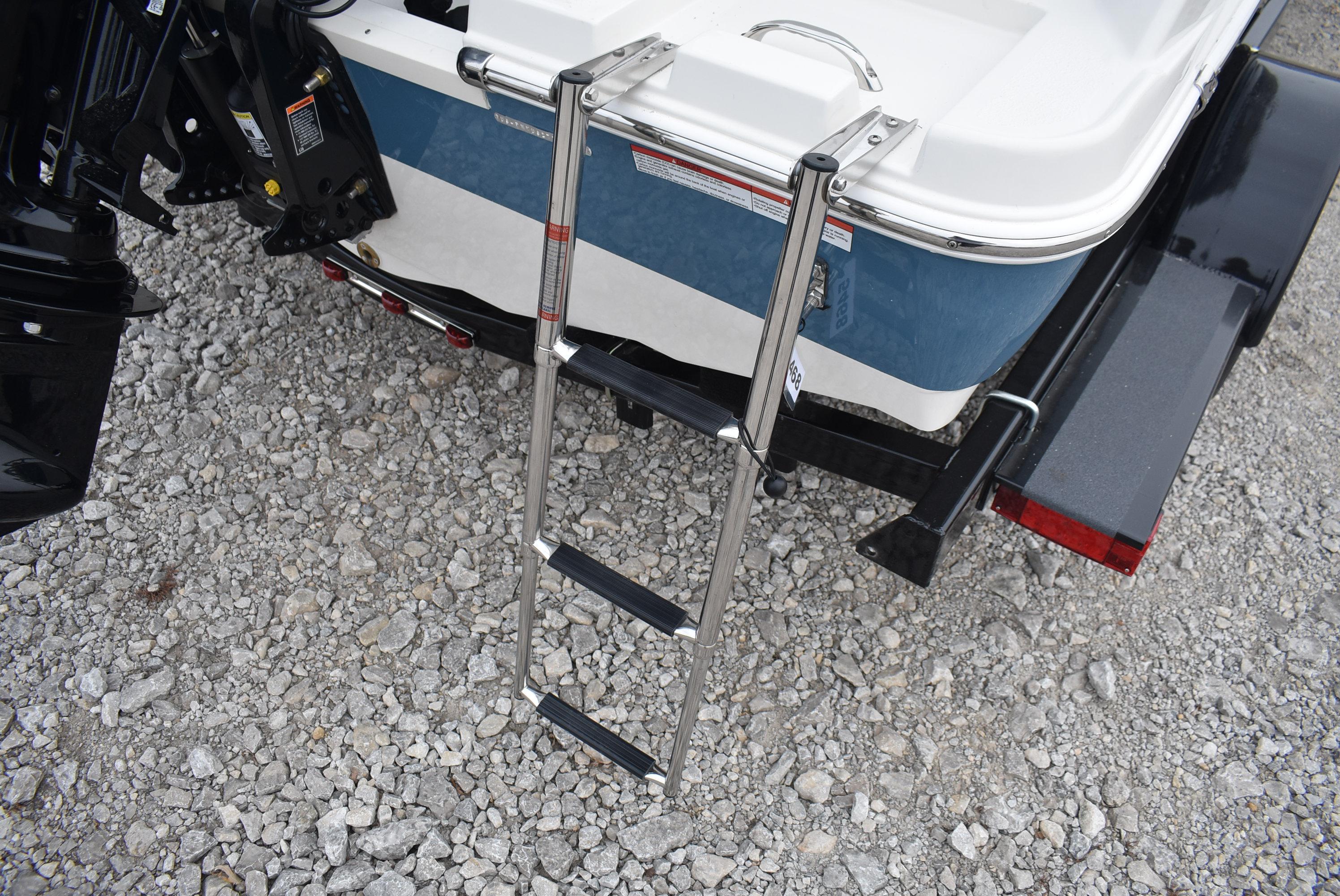 Slide: The Image of 2023 Stingray 172SC boat with ladder on gravel surface. - 5