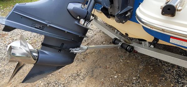 Slide: The Image of 2019 Stingray 186 CC boat motor and propeller on trailer. - 13