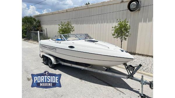 Slide: The Image of 1999 Stingray 200 CS/CX boat on trailer at Portside Marine. - 0