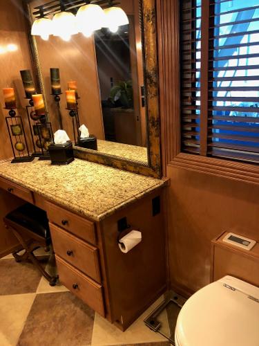 Slide: The Image of Luxurious bathroom in a 2008 Sumerset Houseboat 20' x 100' with granite countertop. - 17