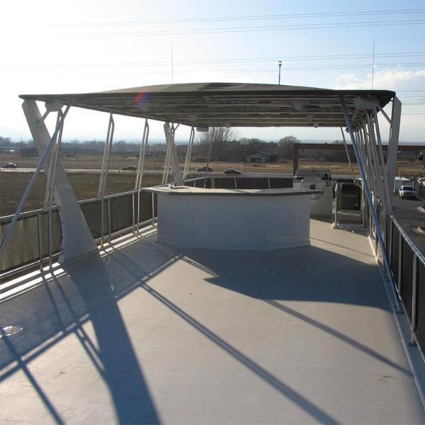 Slide: The Image of Top deck of 2006 American Waterways Desert Rain Trip 15 boat with shaded seating area. - 7