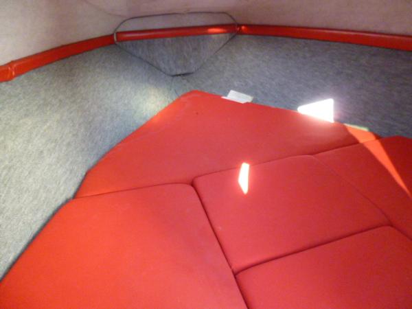 Slide: The Image of Interior of 1990 Sunbird CORSICA 188 Cuddy Cabin with red cushions. - 12