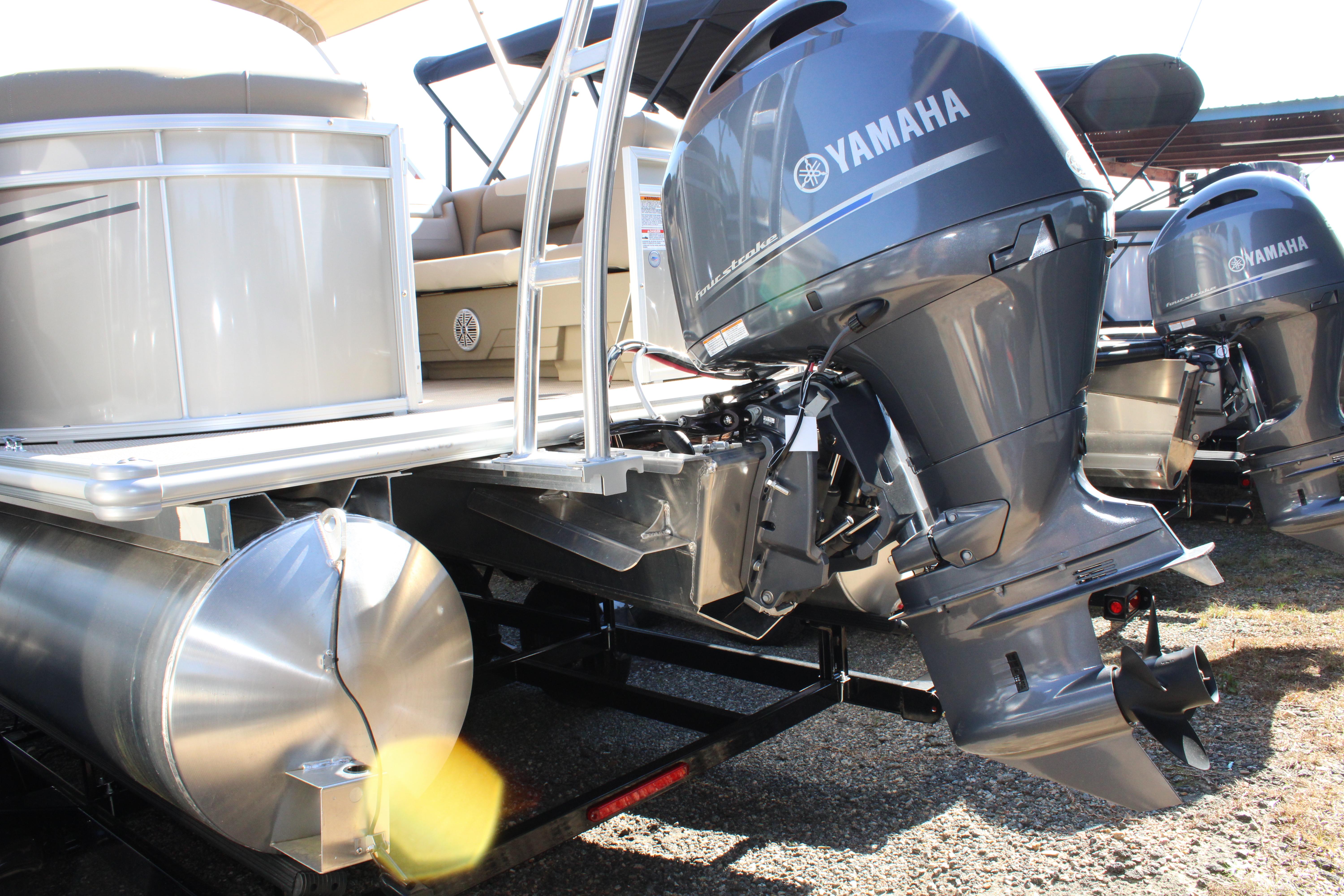 Slide: The Image of 2023 SunChaser Geneva Cruise 22 LR DH pontoon boat with Yamaha outboard motors. - 13