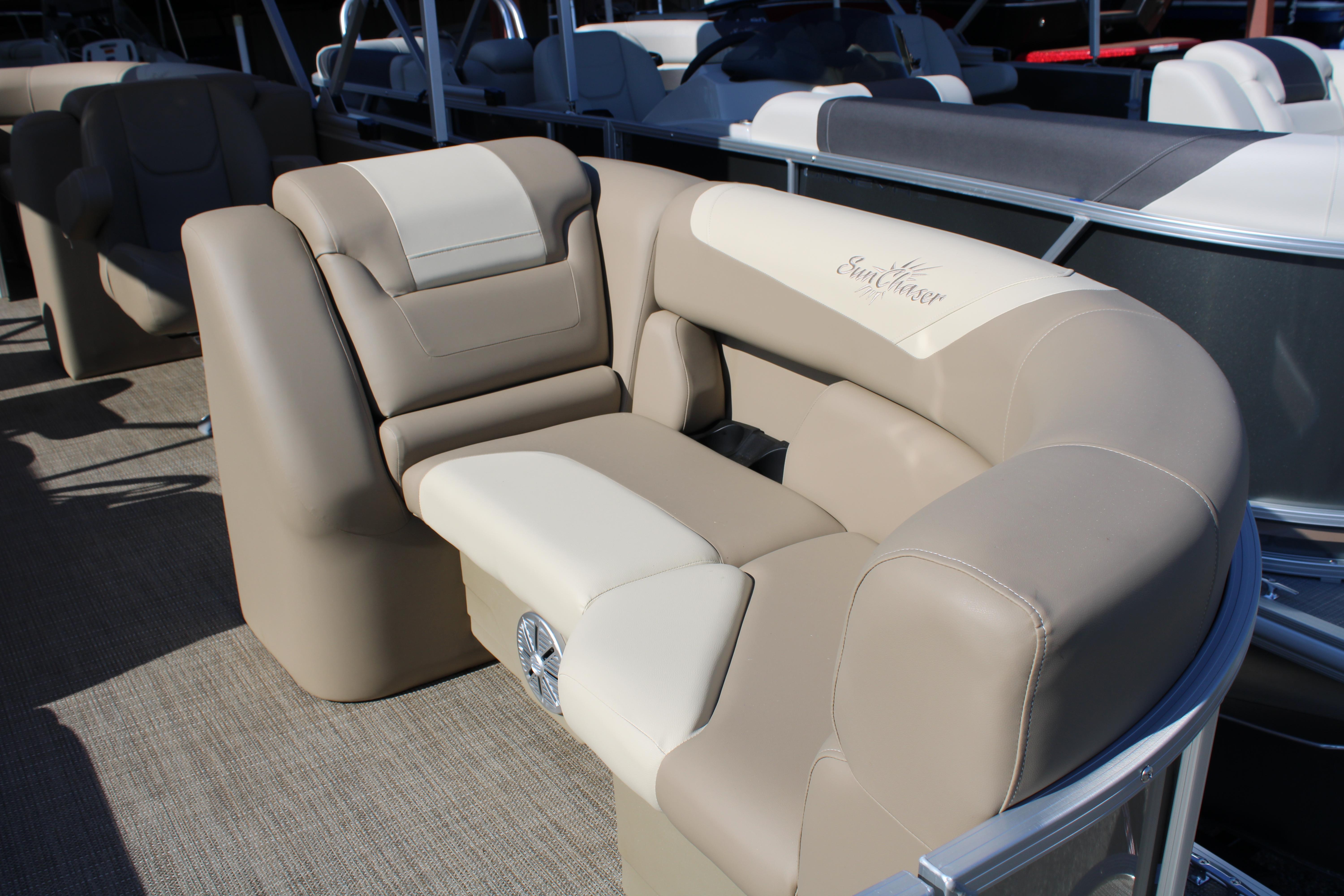 Slide: The Image of 2023 SunChaser Geneva Cruise 22 LR DH boat interior with beige and cream seating. - 15