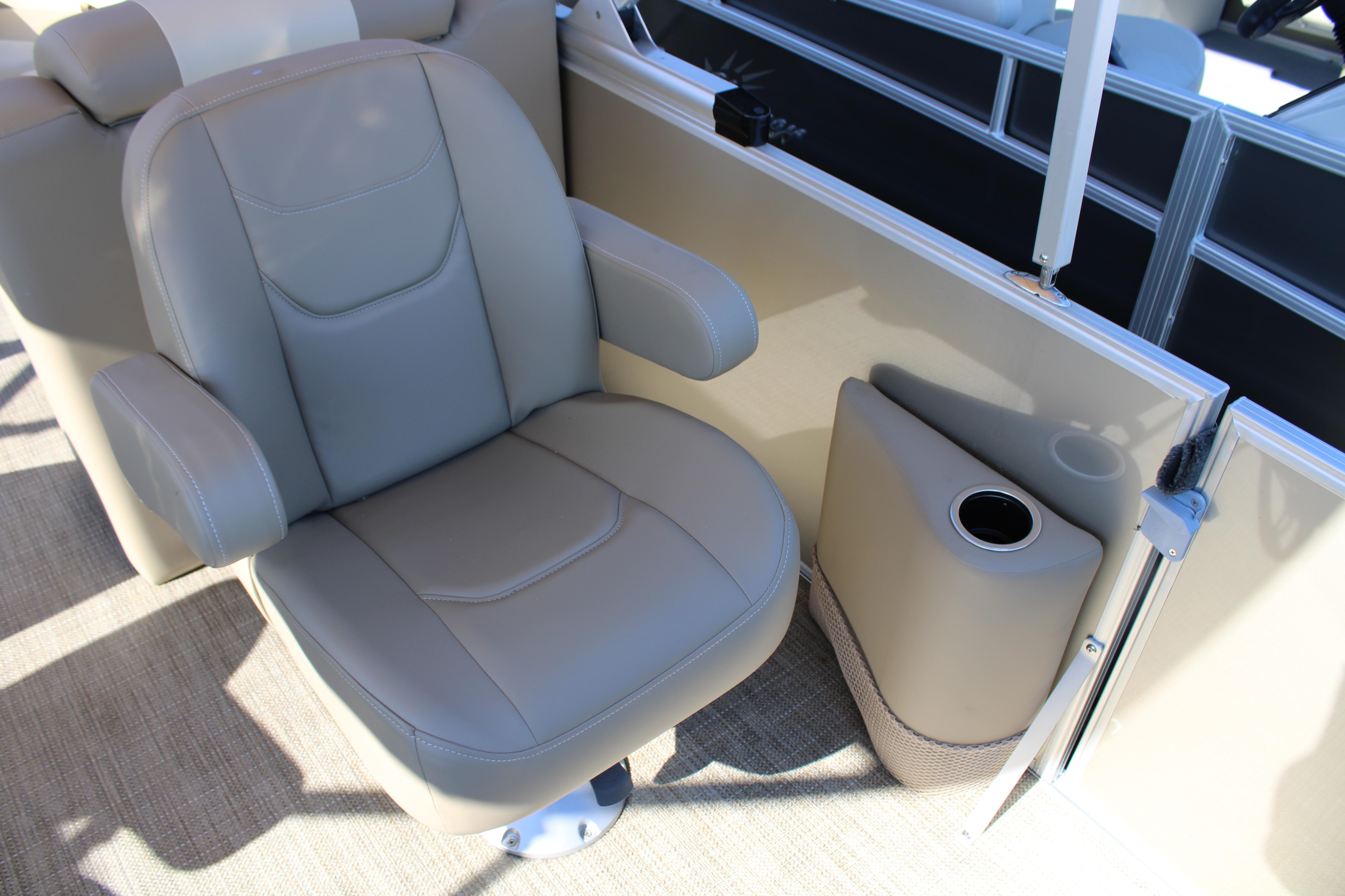 Slide: The Image of Captain's chair and cup holder on 2023 SunChaser Geneva Cruise 22 LR DH pontoon boat. - 16