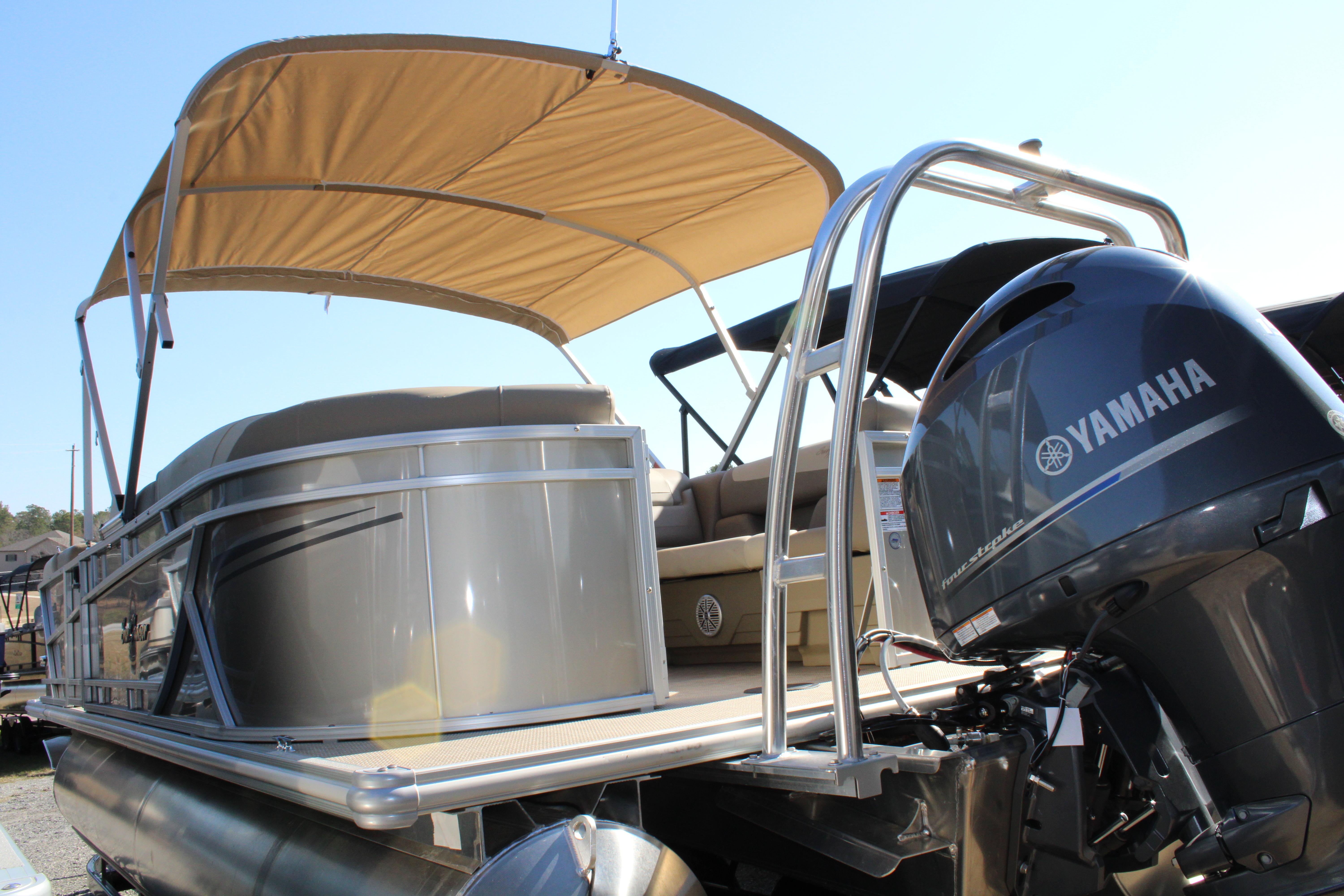 Slide: The Image of 2023 SunChaser Geneva Cruise 22 LR DH pontoon boat with Yamaha outboard motor. - 3