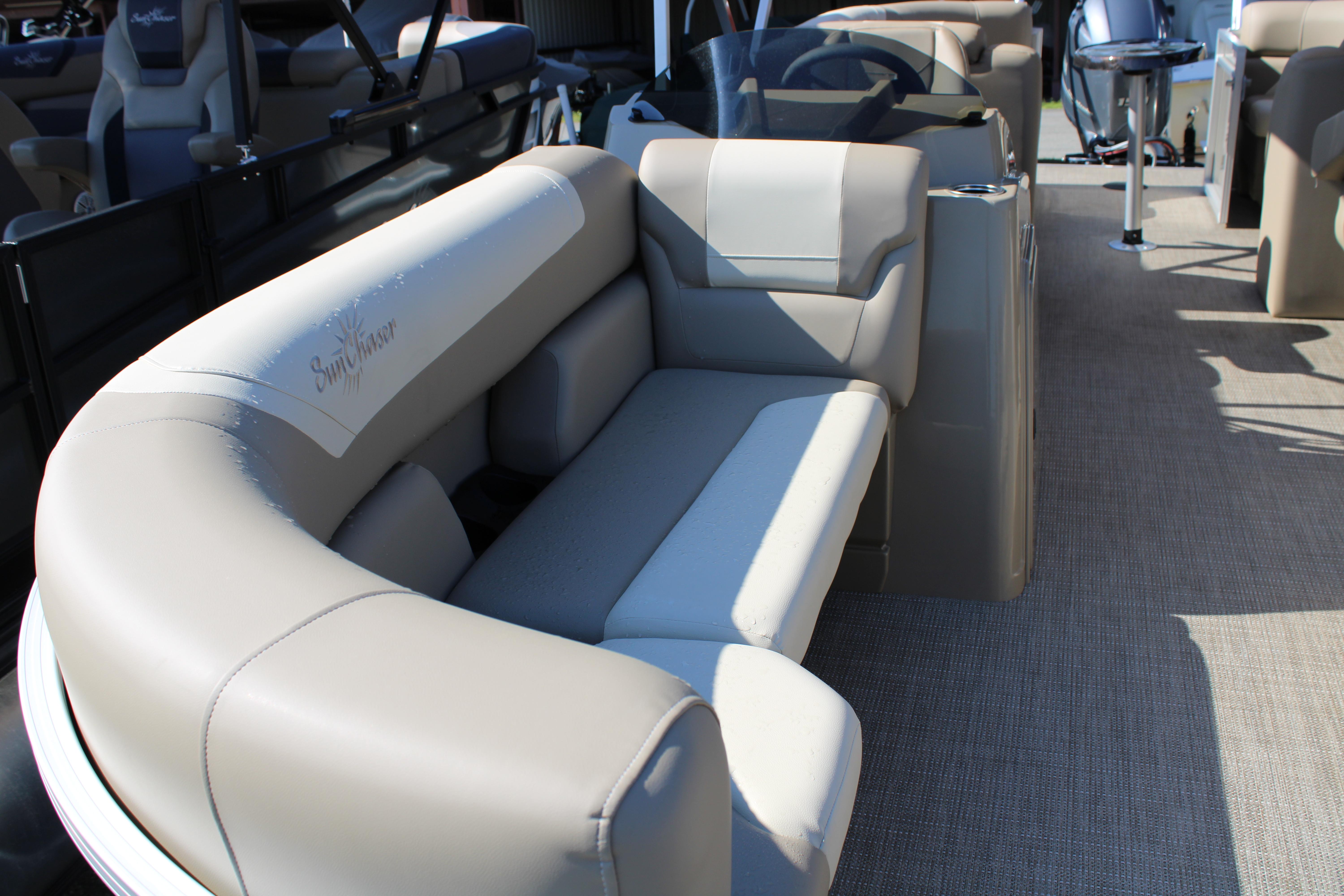 Slide: The Image of 2023 SunChaser Geneva Cruise 22 LR DH pontoon boat interior with beige seating. - 5