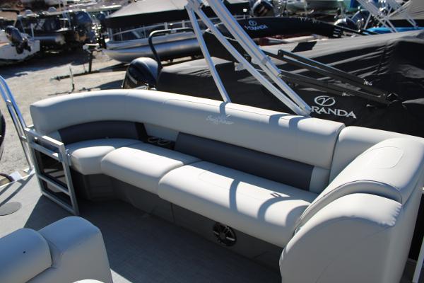 Slide: The Image of 2024 SunChaser Vista 22 LR pontoon boat with spacious seating and modern design. - 10