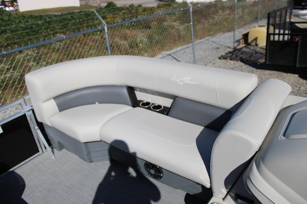 Slide: The Image of 2024 SunChaser Vista 22 LR pontoon boat with comfortable seating and cup holders. - 4