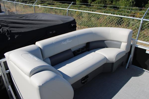 Slide: The Image of 2024 SunChaser Vista 22 LR boat with luxurious seating and cup holders. - 6