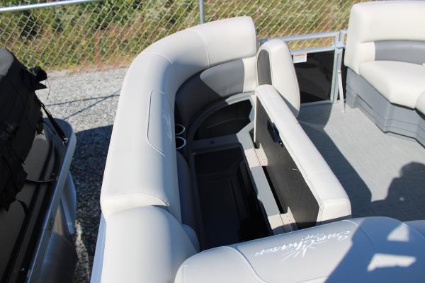Slide: The Image of 2024 SunChaser Vista 22 LR pontoon boat interior with spacious seating and storage. - 7