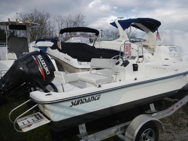 Slide: The Image of 2016 Sundance 17 Center Console boat with Suzuki outboard motor for sale. - 1