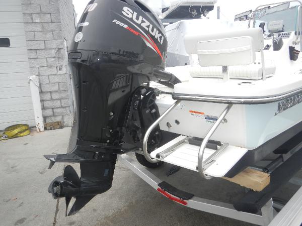 Slide: The Image of 2016 Sundance 17 Center Console boat with Suzuki outboard motor. - 22
