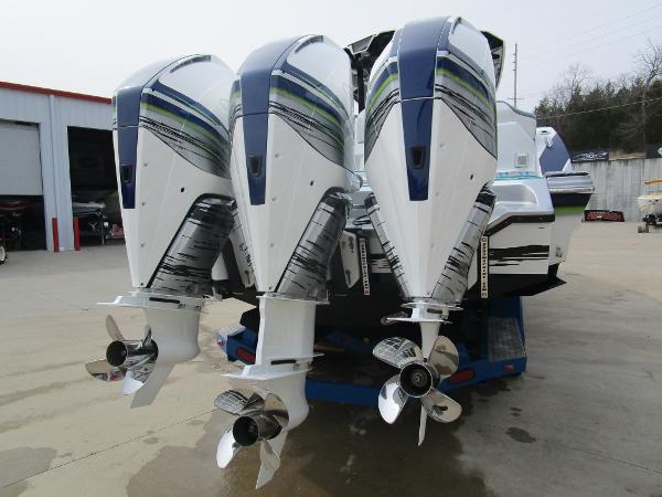 Slide: The Image of 2024 Sunsation 40CCX boat with triple outboard engines. - 12