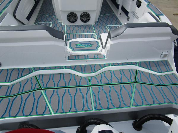 Slide: The Image of 2024 Sunsation 40CCX boat interior with custom flooring and seating. - 14
