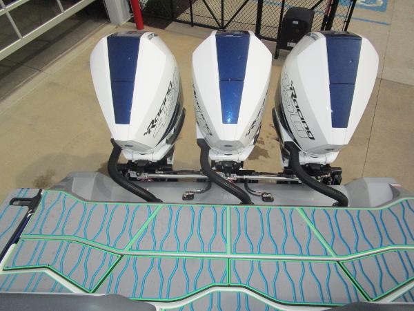 Slide: The Image of 2024 Sunsation 40CCX boat with triple outboard engines. - 16