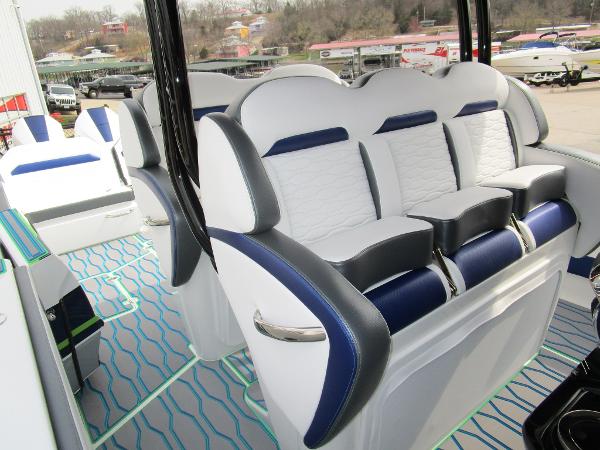 Slide: The Image of 2024 Sunsation 40CCX boat interior with luxurious seating and modern design. - 22