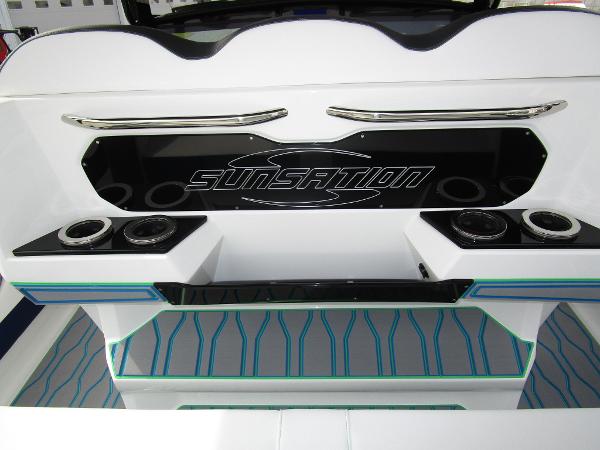 Slide: The Image of 2024 Sunsation 40CCX boat interior with branded logo and modern design. - 23
