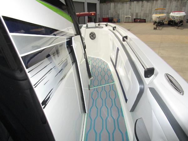 Slide: The Image of 2024 Sunsation 40CCX boat deck with modern design and sleek graphics. - 29
