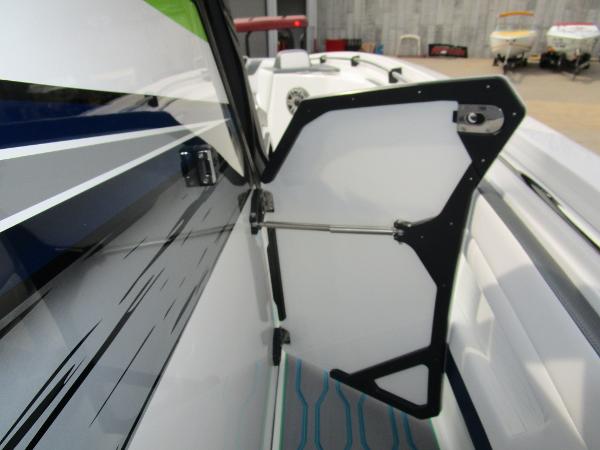 Slide: The Image of 2024 Sunsation 40CCX boat interior with open door and sleek design. - 30