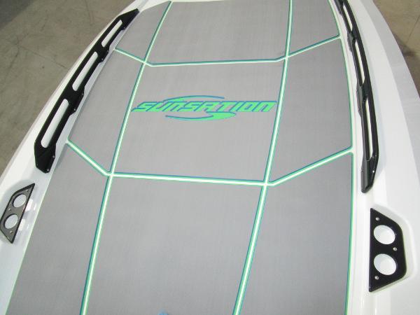 Slide: The Image of 2024 Sunsation 40CCX boat deck with logo and sleek design. - 33
