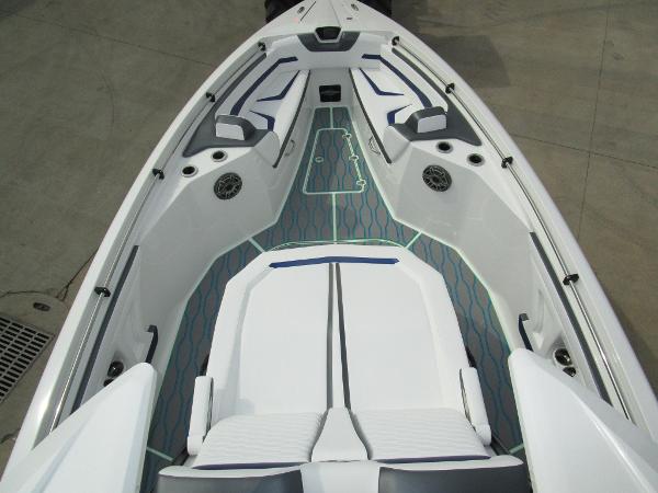 Slide: The Image of 2024 Sunsation 40CCX boat interior with white and blue seating. - 34