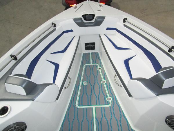 Slide: The Image of 2024 Sunsation 40CCX boat interior with white and blue seating. - 35