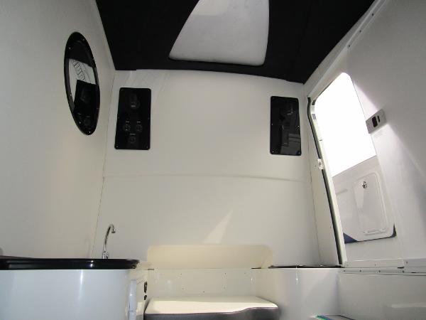 Slide: The Image of Interior cabin of 2024 Sunsation 40CCX boat with seating and sink. - 41