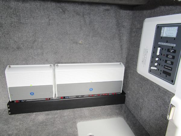 Slide: The Image of Electrical panel and components inside a 2024 Sunsation 40CCX boat. - 42