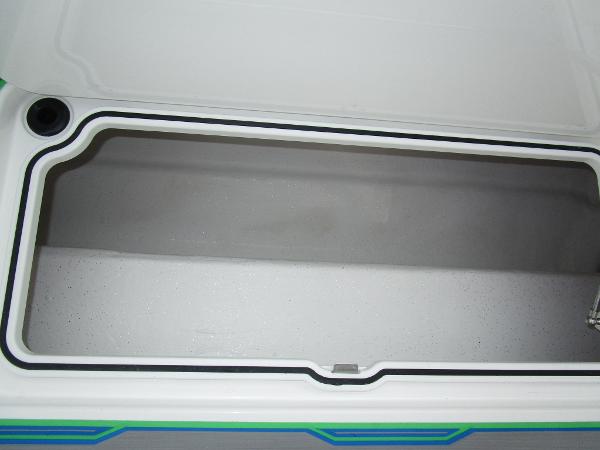 Slide: The Image of Open storage compartment of 2024 Sunsation 40CCX boat. - 44