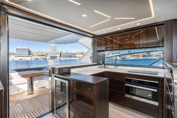Slide: The Image of Modern kitchen on 2022 Sunseeker Manhattan 55 yacht with waterfront view. - 19