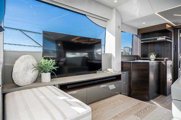 Slide: The Image of Luxurious interior of 2022 Sunseeker Manhattan 55 yacht with modern decor and large TV. - 21