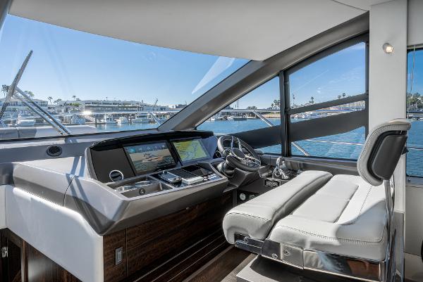 Slide: The Image of 2022 Sunseeker Manhattan 55 yacht helm station with modern navigation systems. - 24
