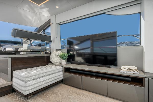 Slide: The Image of Luxurious interior of 2022 Sunseeker Manhattan 55 yacht with modern decor and large TV. - 26
