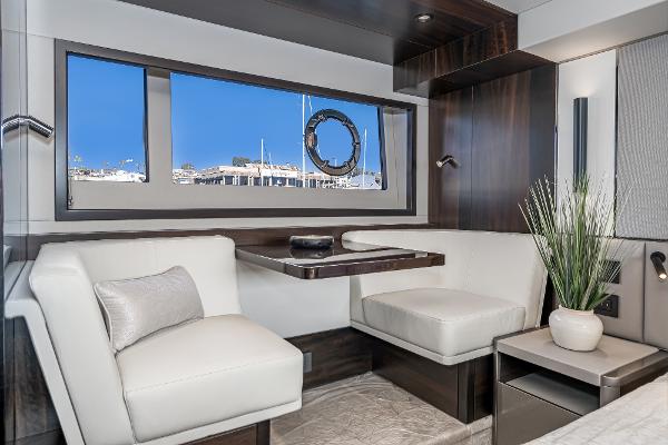 Slide: The Image of Luxurious interior of 2022 Sunseeker Manhattan 55 yacht with modern seating and large window. - 29