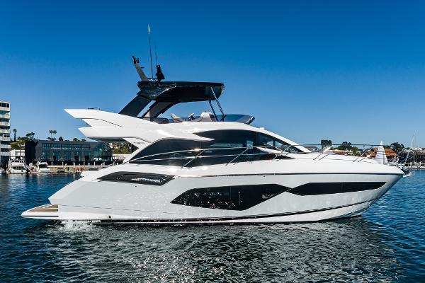 Slide: The Image of 2022 Sunseeker Manhattan 55 yacht on water, side view. - 3