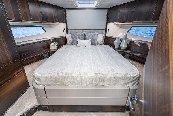 Slide: The Image of Luxurious bedroom interior of 2022 Sunseeker Manhattan 55 yacht with ocean view. - 31