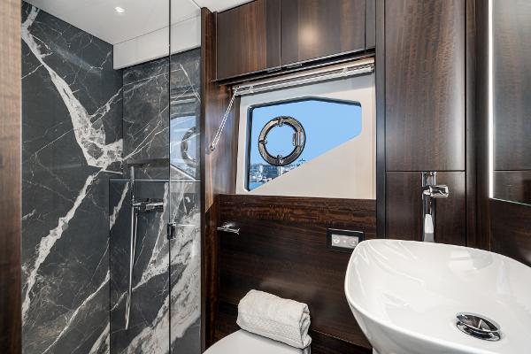 Slide: The Image of Luxurious bathroom in 2022 Sunseeker Manhattan 55 yacht with marble accents and modern fixtures. - 34
