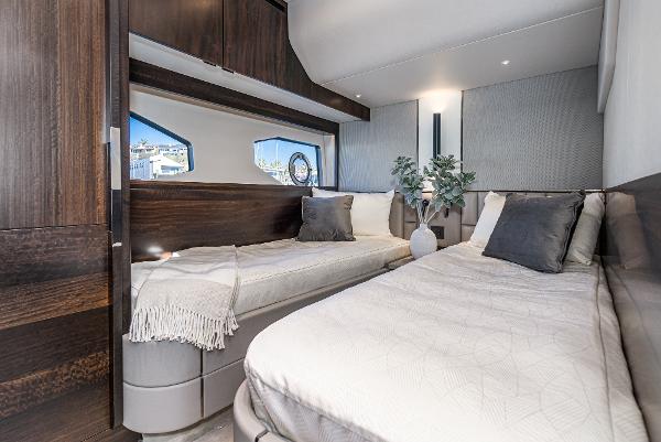 Slide: The Image of Luxurious twin bedroom in 2022 Sunseeker Manhattan 55 yacht with modern decor. - 36