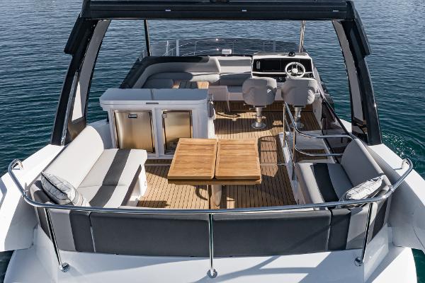 Slide: The Image of Sunseeker Manhattan 55 2022 yacht interior with seating and dining area. - 9